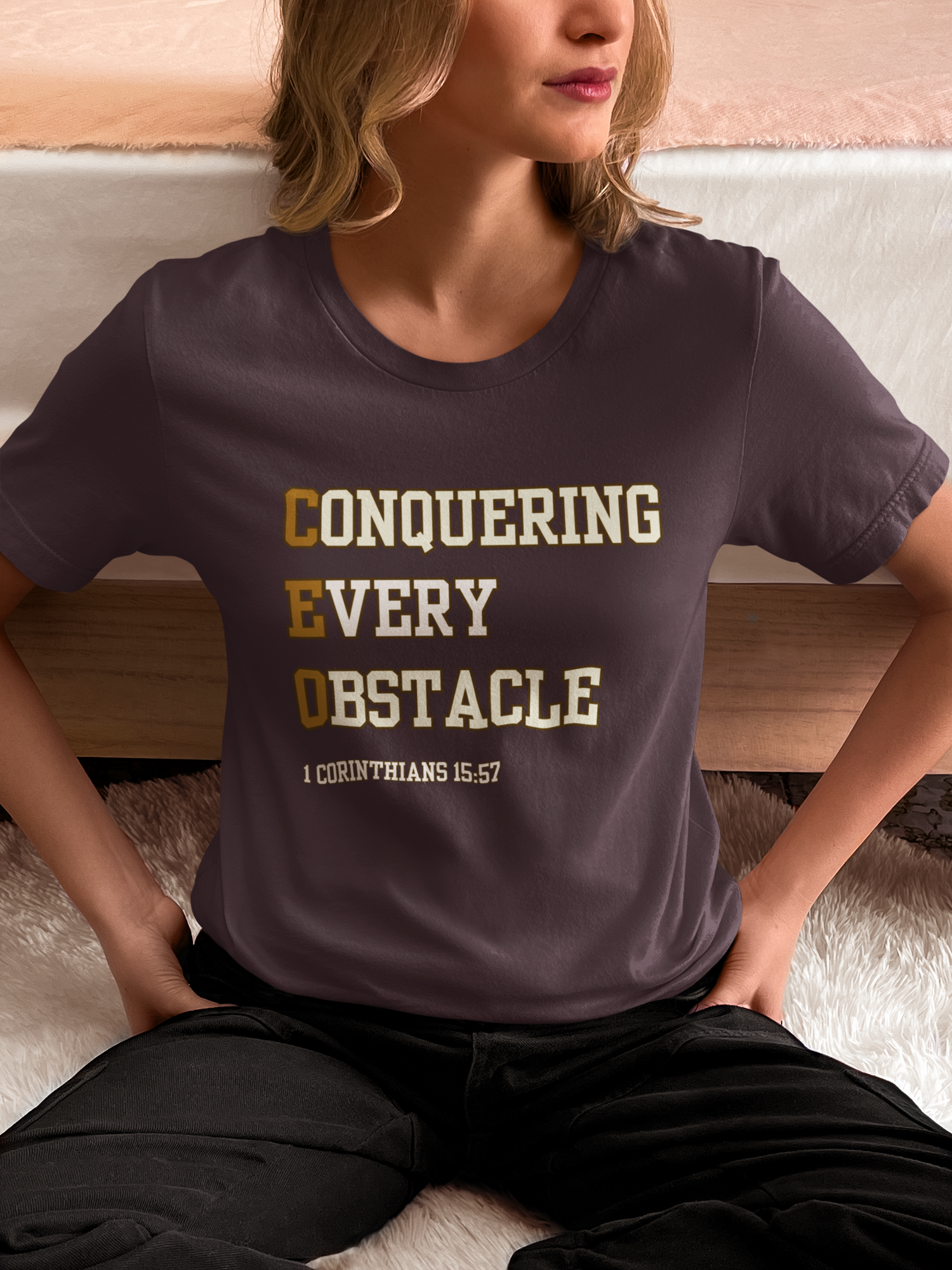 Woman wearing Christian t-shirt with inspiring message and Bible verse reference.
